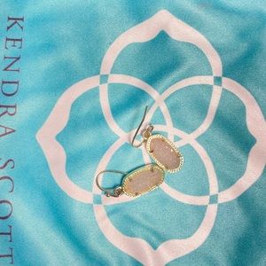 Kendra Scott earrings.